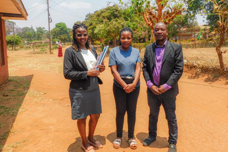 Principal Legal Aid Advocate Emily Kusani (left) with the clients